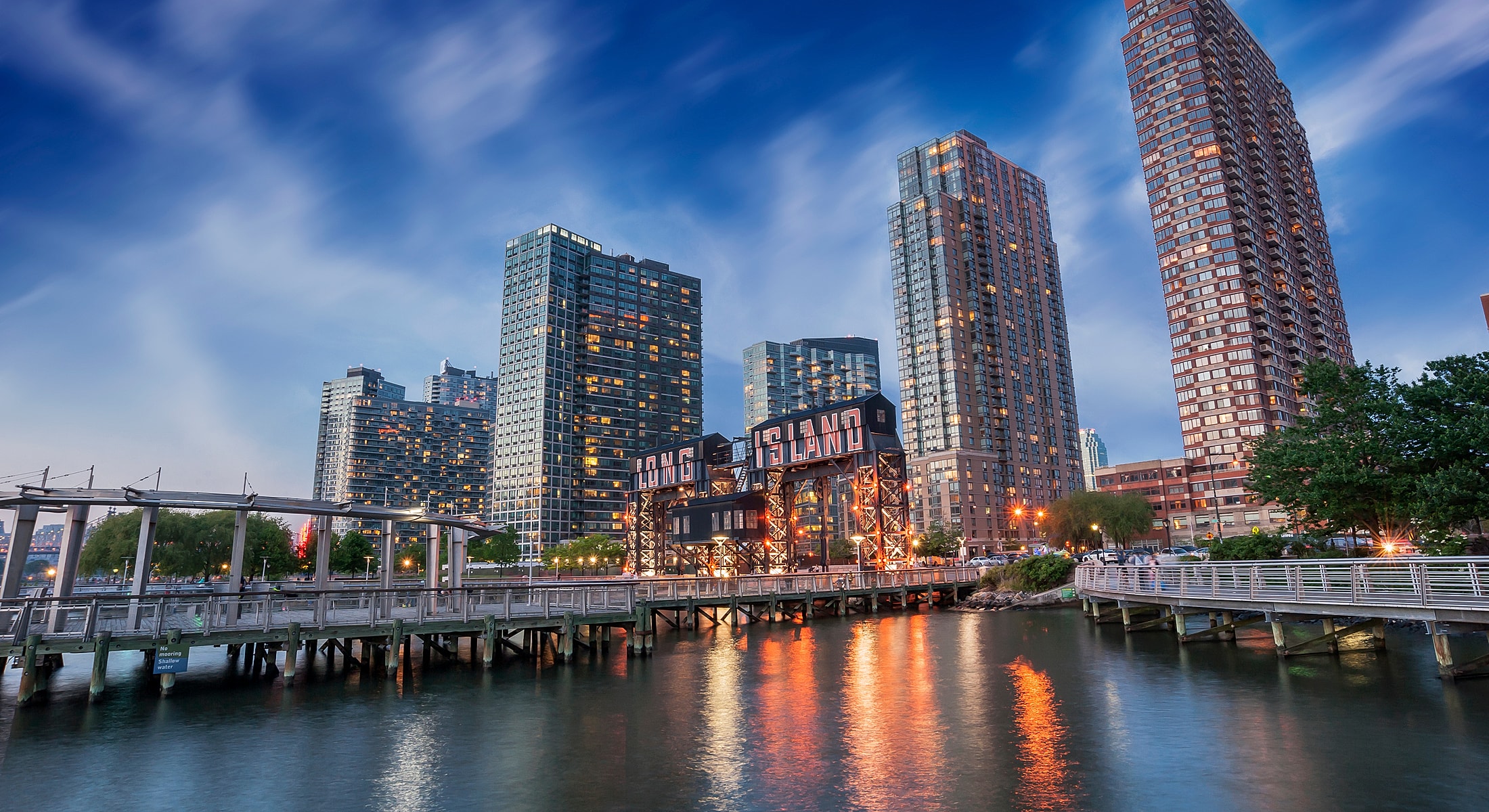 Urban waterfront view with high-rise buildings.